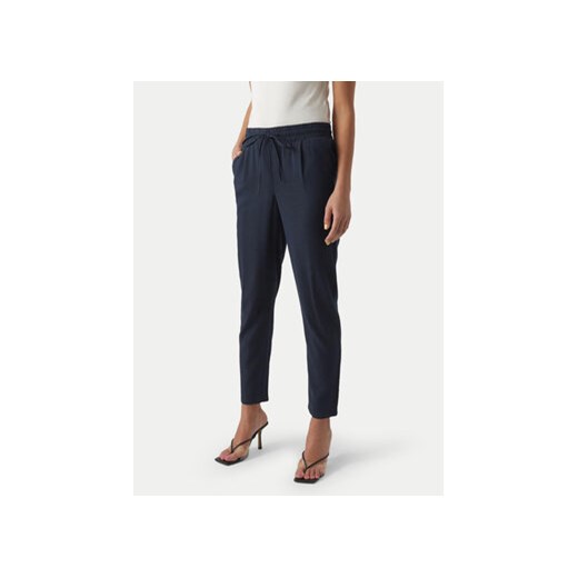 Vero Moda Spodnie materiałowe Jesmilo 10279691 Granatowy Regular Fit ze sklepu MODIVO w kategorii Spodnie damskie - zdjęcie 172159308