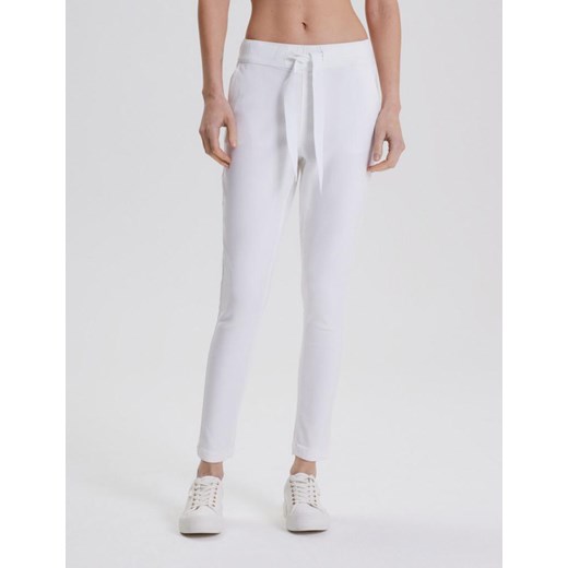 Spodnie RIDIEA Biały 34 ze sklepu Diverse w kategorii Spodnie damskie - zdjęcie 172184447