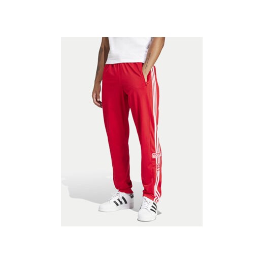 adidas Spodnie dresowe adicolor Classics Adibreak IM8221 Czerwony Regular Fit ze sklepu MODIVO w kategorii Spodnie męskie - zdjęcie 172187788
