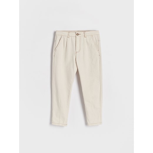 Reserved - Spodnie chino regular fit - złamana biel ze sklepu Reserved w kategorii Spodnie chłopięce - zdjęcie 172194667