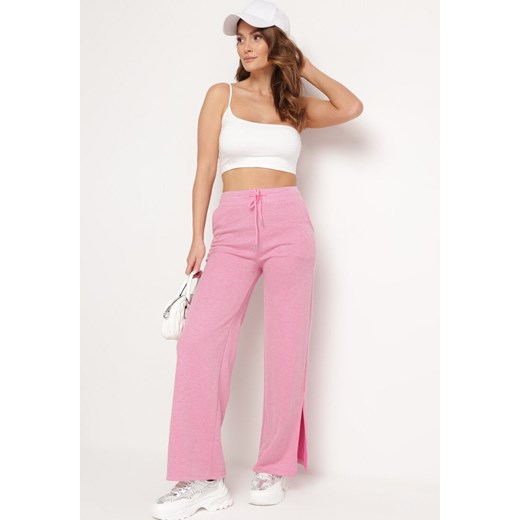 Różowe Szerokie Spodnie z Gumką w Pasie i Rozcięciami Jacilla ze sklepu Born2be Odzież w kategorii Spodnie damskie - zdjęcie 172198955