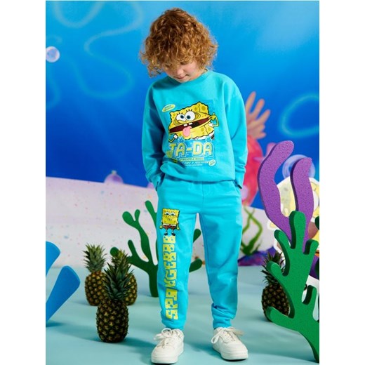 Sinsay - Spodnie dresowe jogger SpongeBob - niebieski ze sklepu Sinsay w kategorii Spodnie chłopięce - zdjęcie 172241245