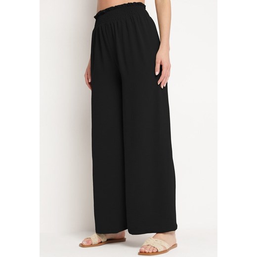 Czarne Szerokie Spodnie z Gumką w Pasie Fiameta ze sklepu Born2be Odzież w kategorii Spodnie damskie - zdjęcie 172244249