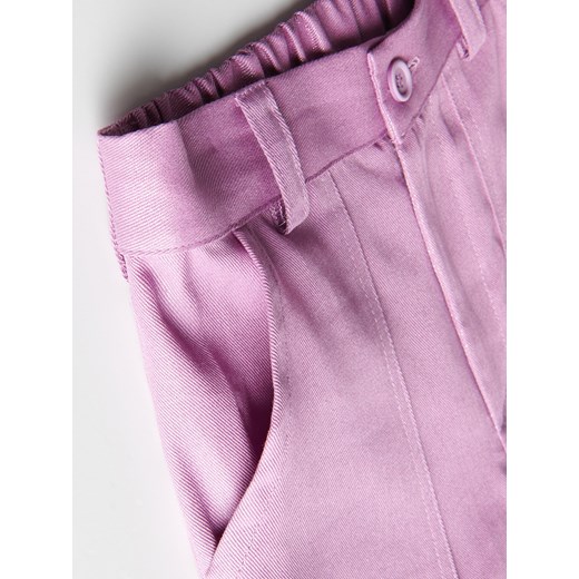Reserved - Błyszczące spodnie - brudny róż ze sklepu Reserved w kategorii Spodnie dziewczęce - zdjęcie 172274477