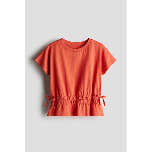 H & M - Top z bawełnianego dżerseju z baskinką - Pomarańczowy ze sklepu H&M w kategorii Bluzki dziewczęce - zdjęcie 172292337