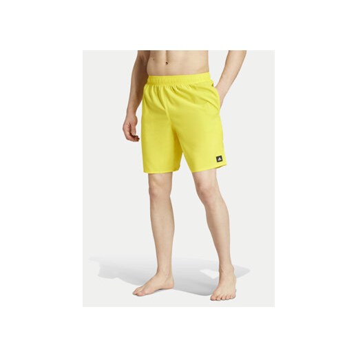 adidas Szorty kąpielowe Solid CLX IR6218 Żółty Regular Fit ze sklepu MODIVO w kategorii Kąpielówki - zdjęcie 172296438