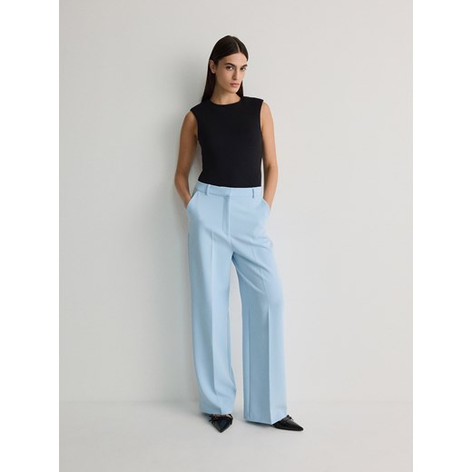 Reserved - Spodnie z kantem - jasnoniebieski ze sklepu Reserved w kategorii Spodnie damskie - zdjęcie 172310359