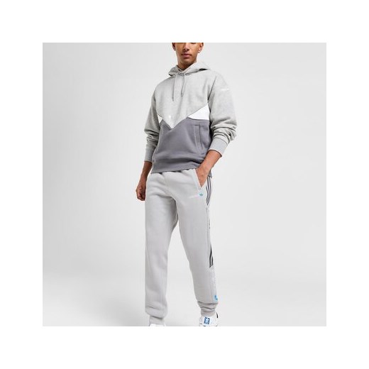 Spodnie męskie Adidas w paski
