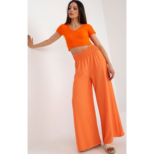Spodnie damskie pomarańczowe Italy Moda casualowe 
