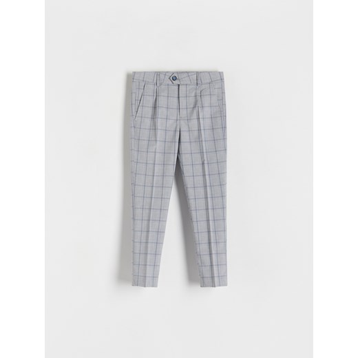 Reserved - Eleganckie spodnie slim - granatowy ze sklepu Reserved w kategorii Spodnie chłopięce - zdjęcie 172363727