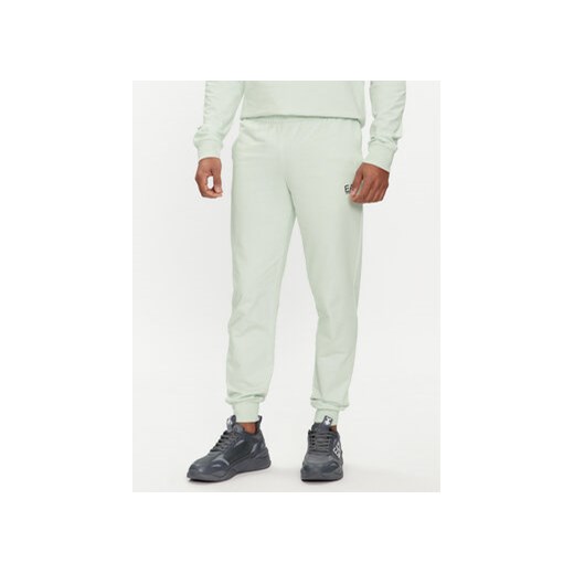 EA7 Emporio Armani Spodnie dresowe 8NPP53 PJ05Z 1133 Zielony Slim Fit ze sklepu MODIVO w kategorii Spodnie męskie - zdjęcie 172390099