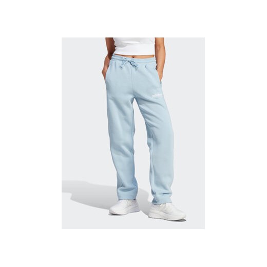 adidas Spodnie dresowe All SZN Fleece Graphic IL3244 Błękitny Loose Fit ze sklepu MODIVO w kategorii Spodnie damskie - zdjęcie 172390109