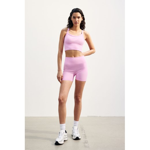 H & M - Bezszwowe szorty sportowe hotpants DryMove - Różowy H & M M H&M