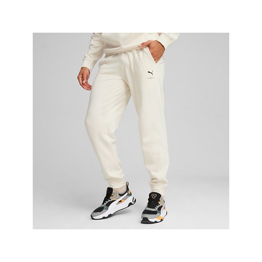 Puma Spodnie dresowe &quot;Better Sportswear&quot; w kolorze białym ze sklepu Limango Polska w kategorii Spodnie męskie - zdjęcie 172423999