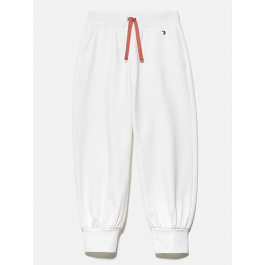 Sisley Spodnie dresowe w kolorze białym ze sklepu Limango Polska w kategorii Spodnie dziewczęce - zdjęcie 172436107