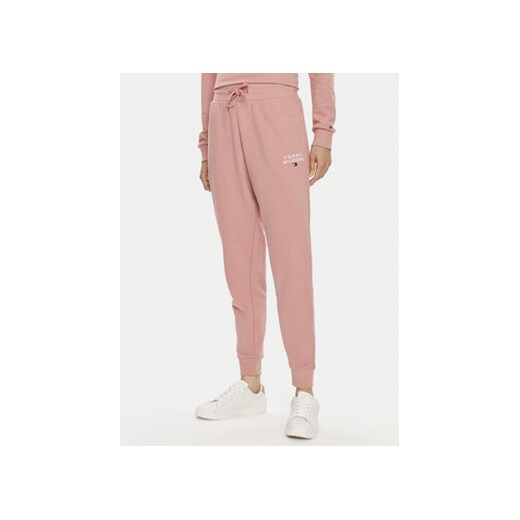 Tommy Hilfiger Spodnie dresowe UW0UW04522 Różowy Regular Fit ze sklepu MODIVO w kategorii Spodnie damskie - zdjęcie 172449688