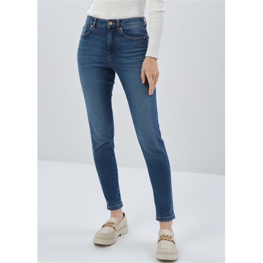 Granatowe spodnie jeansowe damskie Ochnik One Size OCHNIK promocja