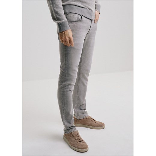 Szare spodnie jeansowe męskie Ochnik One Size wyprzedaż OCHNIK