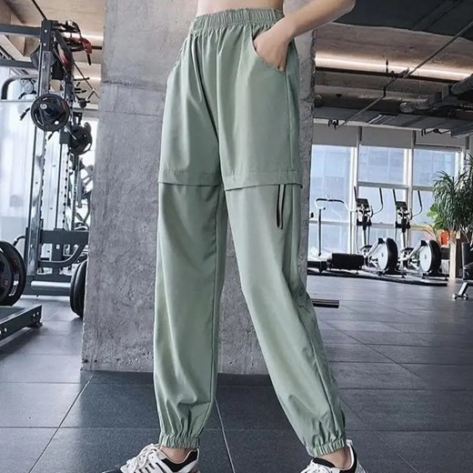 Spodnie dresowe odpinane nogawki - Zielony / M ze sklepu Maybella.pl w kategorii Spodnie damskie - zdjęcie 172590427
