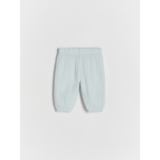 Reserved - Spodnie z bawełnianego muślinu - jasnoniebieski ze sklepu Reserved w kategorii Spodnie i półśpiochy - zdjęcie 172619959