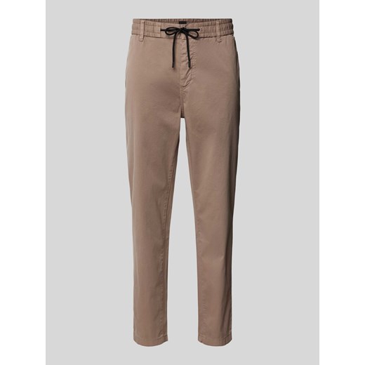 Chinosy o kroju tapered fit z elastycznym pasem ze sklepu Peek&Cloppenburg  w kategorii Spodnie męskie - zdjęcie 172626745
