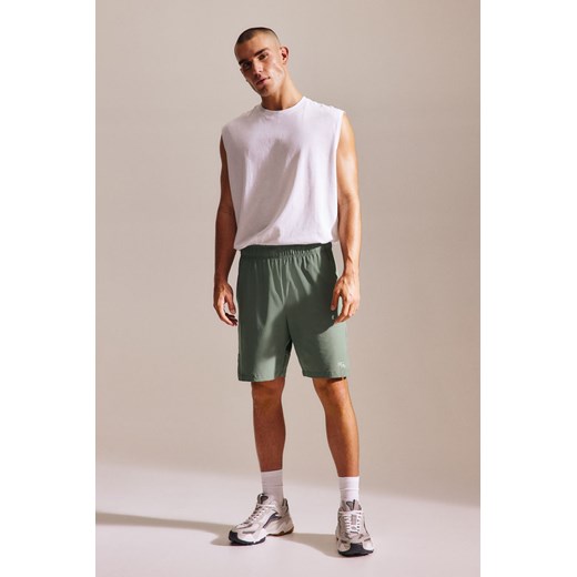 Białe spodenki męskie H & M w sportowym stylu 