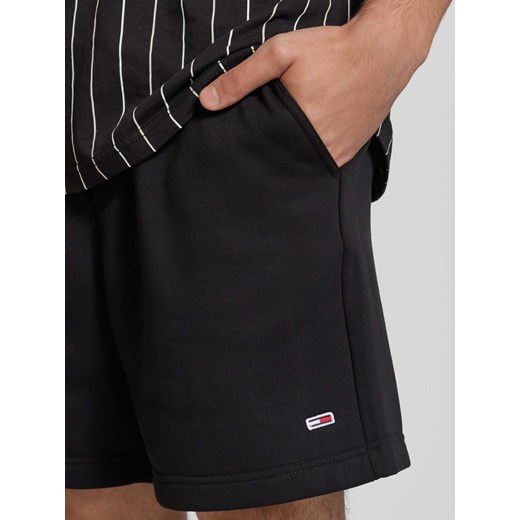 Szorty z dzianiny dresowej o kroju regular fit z naszywką z logo model ‘BEACH’ Tommy Jeans S Peek&Cloppenburg 