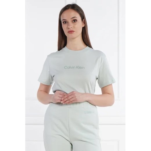 Calvin Klein T-shirt HERO LOGO | Regular Fit ze sklepu Gomez Fashion Store w kategorii Bluzki damskie - zdjęcie 172856016