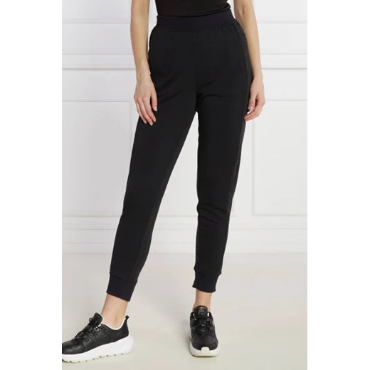 Calvin Klein Performance Spodnie dresowe | Regular Fit ze sklepu Gomez Fashion Store w kategorii Spodnie damskie - zdjęcie 172964738