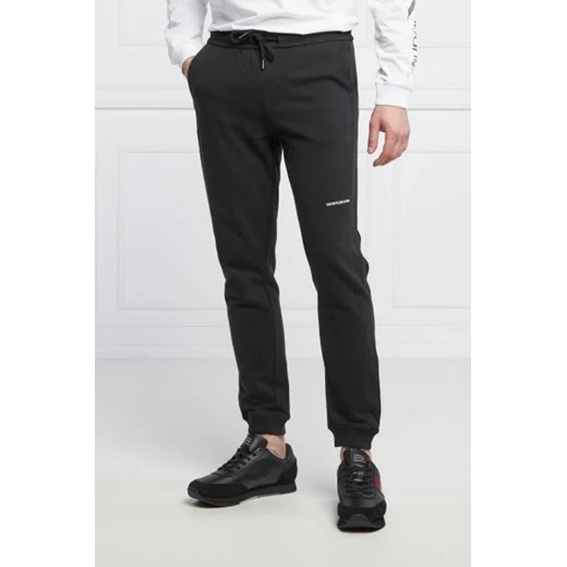 CALVIN KLEIN JEANS Spodnie dresowe | Slim Fit ze sklepu Gomez Fashion Store w kategorii Spodnie męskie - zdjęcie 172965685