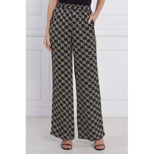 Karl Lagerfeld Spodnie PRINTED MONOGRAM | flare fit | high waist ze sklepu Gomez Fashion Store w kategorii Spodnie damskie - zdjęcie 172975725