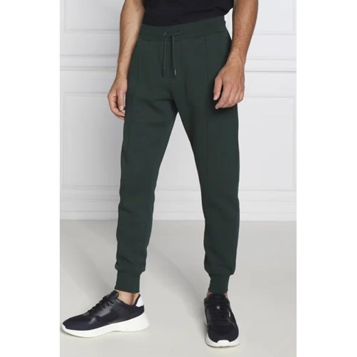 Tommy Hilfiger Spodnie dresowe | Regular Fit ze sklepu Gomez Fashion Store w kategorii Spodnie męskie - zdjęcie 172987826