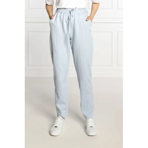Tommy Hilfiger Spodnie dresowe | Regular Fit ze sklepu Gomez Fashion Store w kategorii Spodnie damskie - zdjęcie 172991196