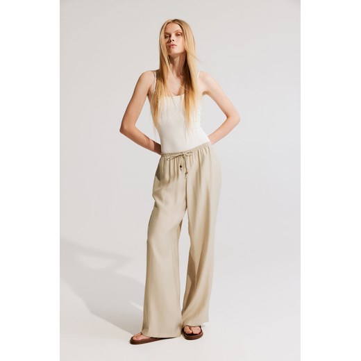 H & M - Szerokie spodnie bez zapięcia - Beżowy ze sklepu H&M w kategorii Spodnie damskie - zdjęcie 173134926