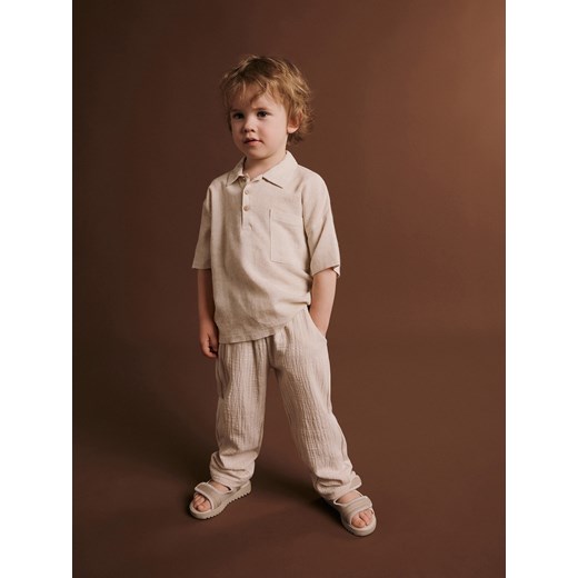 Reserved - Dzianinowe spodnie chino - złamana biel ze sklepu Reserved w kategorii Spodnie i półśpiochy - zdjęcie 173139986