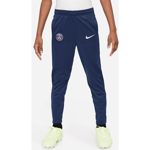 Spodnie piłkarskie z dzianiny dla małych dzieci Nike Dri-FIT Paris Saint-Germain Academy Pro - Niebieski ze sklepu Nike poland w kategorii Spodnie chłopięce - zdjęcie 173311216
