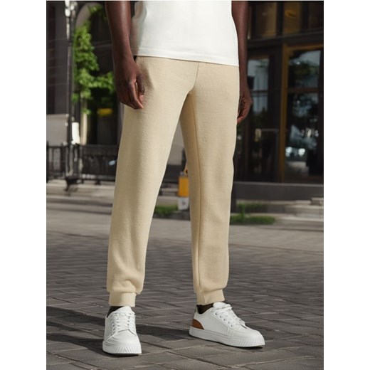 Sinsay - Spodnie dresowe - kremowy ze sklepu Sinsay w kategorii Spodnie męskie - zdjęcie 173370436