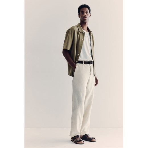 H & M - Lniane spodnie Regular Fit - Beżowy ze sklepu H&M w kategorii Spodnie męskie - zdjęcie 173372216