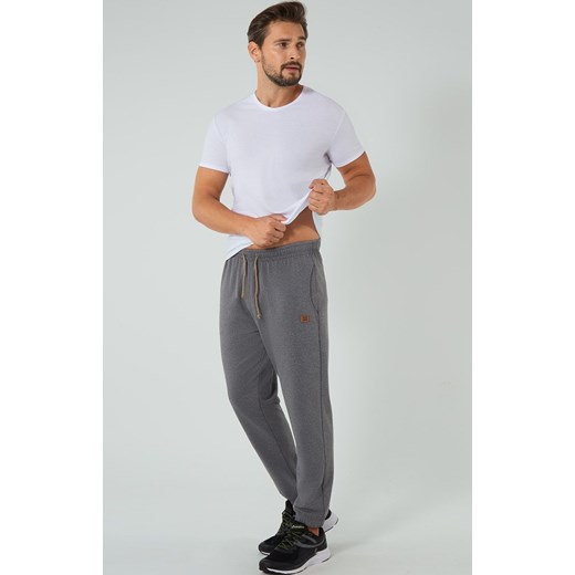 Dresowe spodnie męskie szary melanż Lider, Kolor szary melanż, Rozmiar M, Italian Fashion ze sklepu Intymna w kategorii Spodnie męskie - zdjęcie 173398157