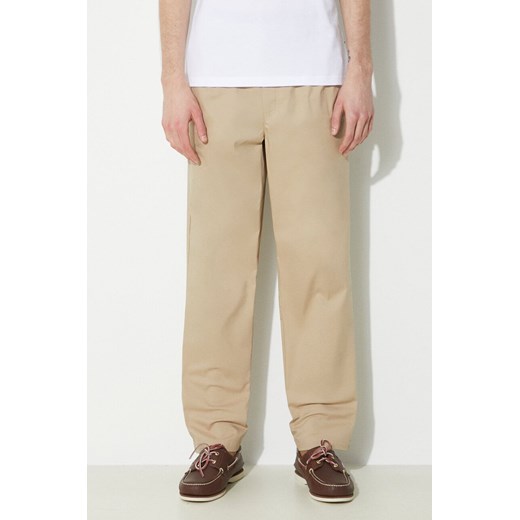 New Balance spodnie Twill Straight Pant 30" męskie kolor beżowy proste MP41575SOT ze sklepu PRM w kategorii Spodnie męskie - zdjęcie 173409195