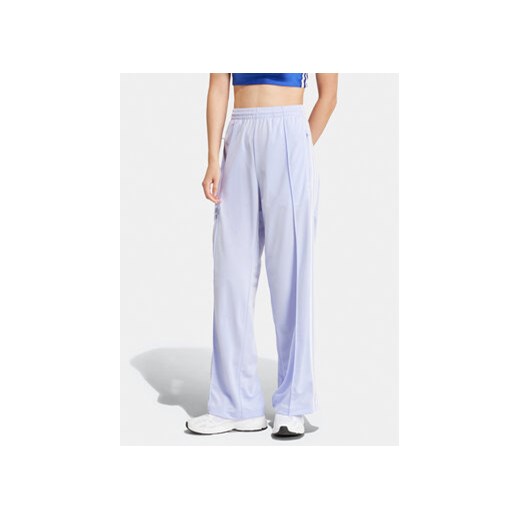 adidas Spodnie dresowe Firebird IP0643 Fioletowy Regular Fit XL MODIVO