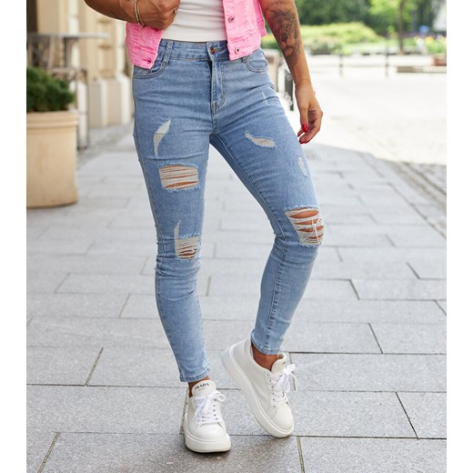 Niebieskie jeansy slim z przetarciami Schilizza ze sklepu gemre w kategorii Jeansy damskie - zdjęcie 173461975