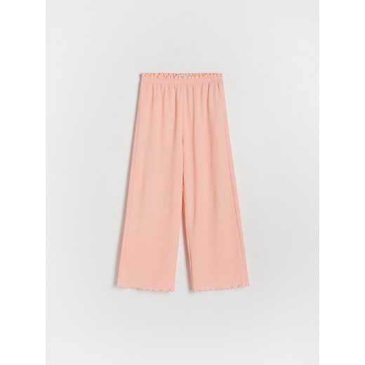 Reserved - Strukturalne spodnie - pomarańczowy ze sklepu Reserved w kategorii Spodnie dziewczęce - zdjęcie 173470685