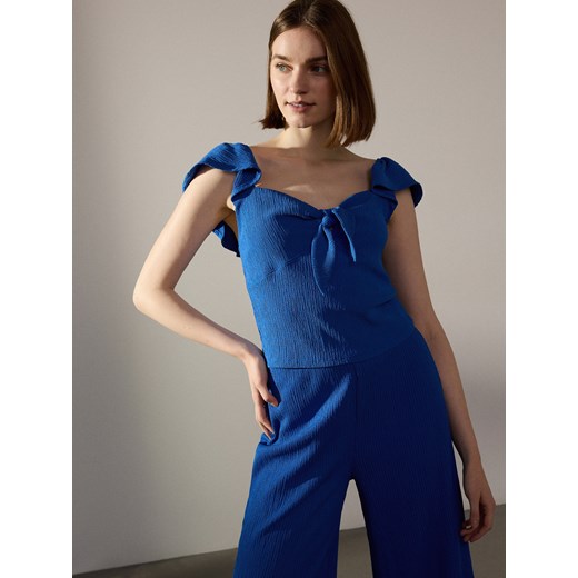 Reserved - Luźne spodnie w prążek - niebieski Reserved S Reserved