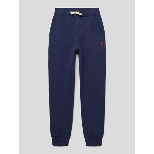 Spodnie dresowe z elastycznym ściągaczem ze sklepu Peek&Cloppenburg  w kategorii Spodnie chłopięce - zdjęcie 173646956