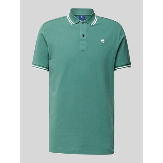 Koszulka polo o kroju slim fit z przedłużonym tyłem model ‘Dunda’ ze sklepu Peek&Cloppenburg  w kategorii T-shirty męskie - zdjęcie 173687905