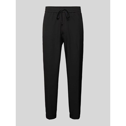 Spodnie o kroju tapered fit z tunelem ze sklepu Peek&Cloppenburg  w kategorii Spodnie męskie - zdjęcie 173739468