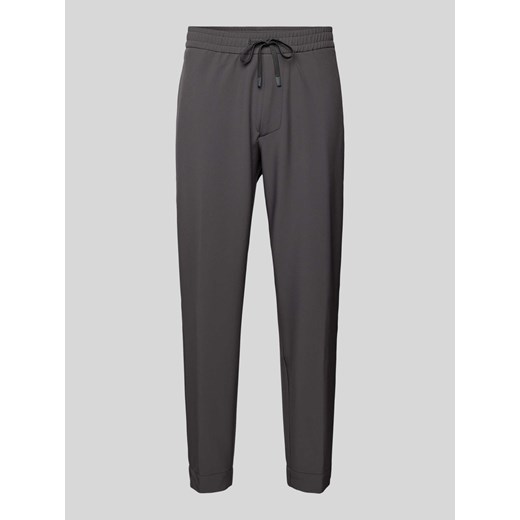 Spodnie o kroju tapered fit z tunelem ze sklepu Peek&Cloppenburg  w kategorii Spodnie męskie - zdjęcie 173739619