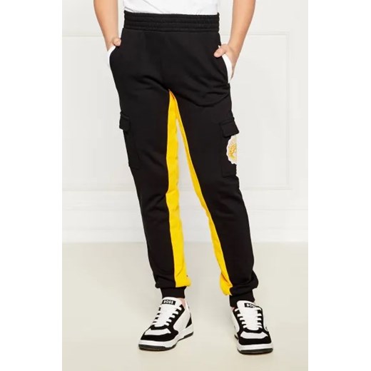 Guess Spodnie | Regular Fit ze sklepu Gomez Fashion Store w kategorii Spodnie chłopięce - zdjęcie 173835519