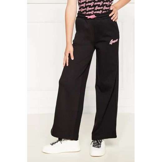 Guess Spodnie dresowe | Regular Fit ze sklepu Gomez Fashion Store w kategorii Spodnie dziewczęce - zdjęcie 173853779